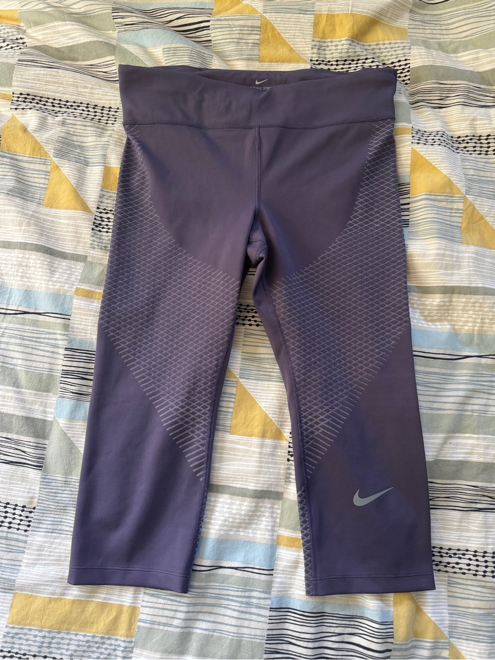 Nike Purple Capri Leggings with Reflective Swoosh and Textured Panels